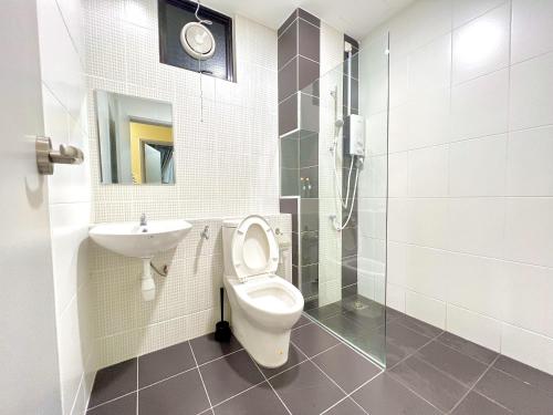 a bathroom with a toilet and a sink at D'Chill Suite【Austin Regency】Netflix in Johor Bahru