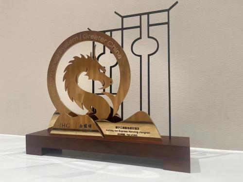 a statue of a horse on top of a book at Holiday Inn Express Nanning Jiangnan by IHG in Nanning