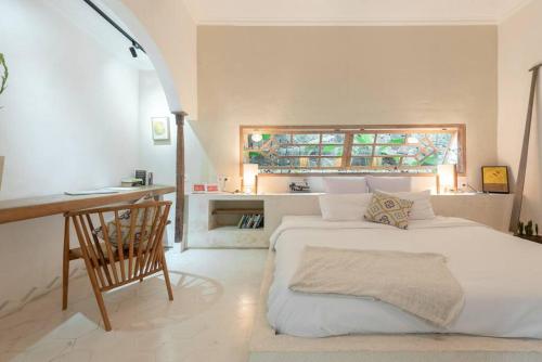 Ένα ή περισσότερα κρεβάτια σε δωμάτιο στο Tropical Villa Canggu Beach