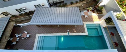 Πισίνα στο ή κοντά στο Acacia Garden Inn and Suites