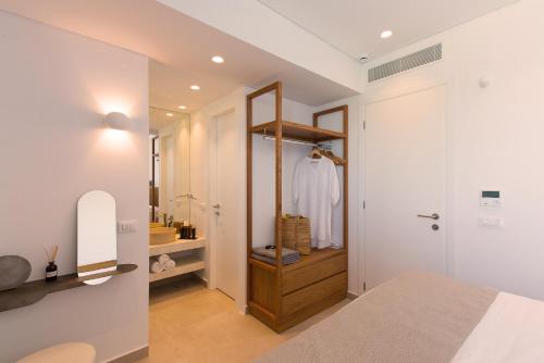 Postel nebo postele na pokoji v ubytování Plethora Luxury Suites