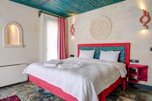 Postel nebo postele na pokoji v ubytování Motif Art Cappadocia