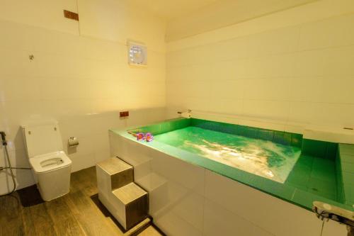 Koupelna v ubytování Elysia Sigiriya Hotel