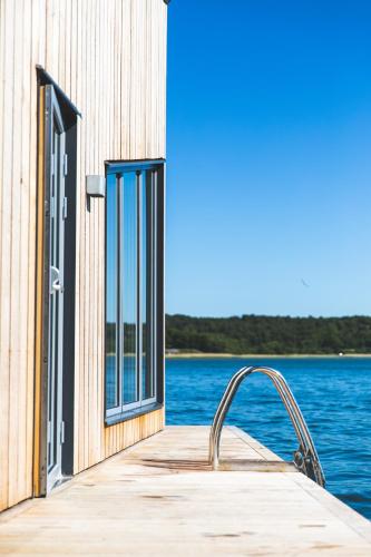 a dock with a view of the water at Stenungsbaden Yacht Club in Stenungsund