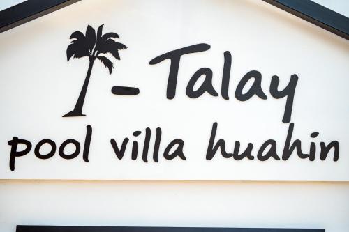 a sign for a pool villailar restaurant with a palm tree at ไอทะเล พูลล่า หัวหิน I-Talay Poolvilla huahin in Hua Hin