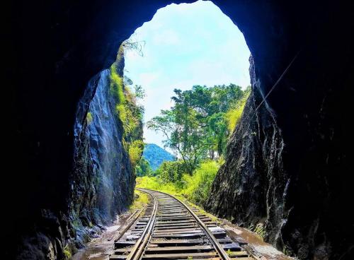a view from a tunnel of a train track at Alagalla Terrace in Kadugannawa