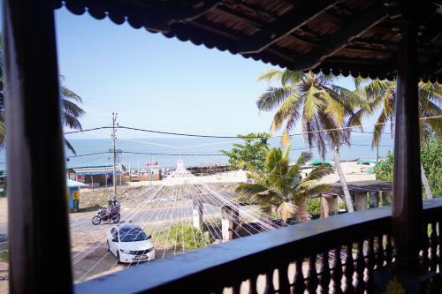 Rõdu või terrass majutusasutuses Timber Monk Beach Resort
