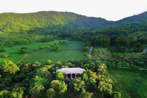 an aerial view of a house in the middle of a forest at SS pool villa hills in Ban Tao Than