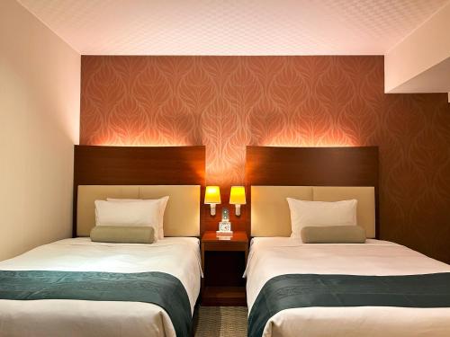 Katil atau katil-katil dalam bilik di Nakajimaya Grand Hotel