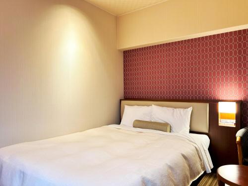 Katil atau katil-katil dalam bilik di Nakajimaya Grand Hotel