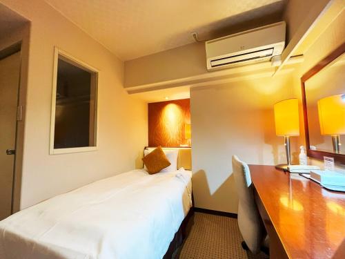 Katil atau katil-katil dalam bilik di Nakajimaya Grand Hotel