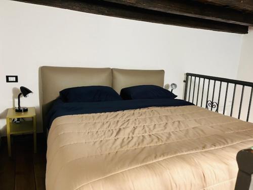 Ένα ή περισσότερα κρεβάτια σε δωμάτιο στο san lorenzo apartment