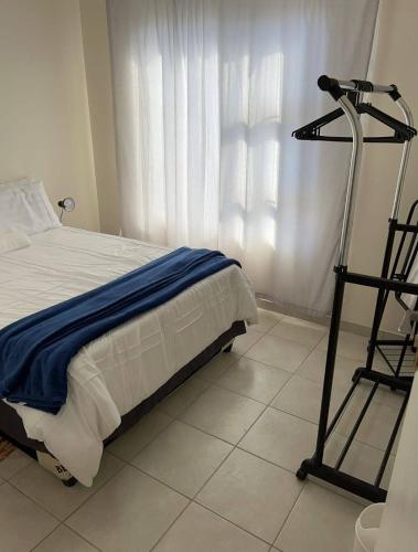 Ένα ή περισσότερα κρεβάτια σε δωμάτιο στο MV self-catering Linden