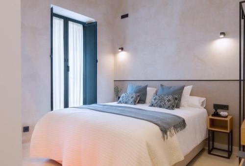 Katil atau katil-katil dalam bilik di Luxurious studio located in Casa Pilatos
