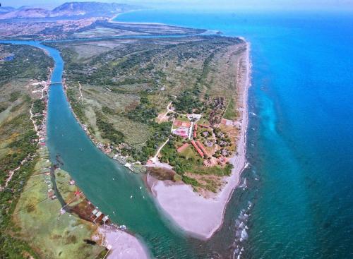 an aerial view of an island in the ocean at Ada Bojana - Kucica Djakonovic in Ulcinj