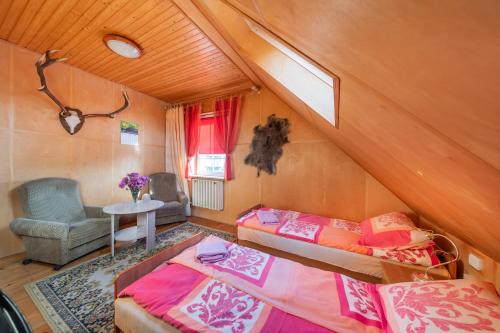 Un pat sau paturi într-o cameră la Pokoje Gościnne Szpak