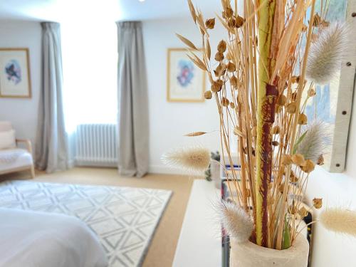 Ένα ή περισσότερα κρεβάτια σε δωμάτιο στο Villa Prat Bras - Appartements