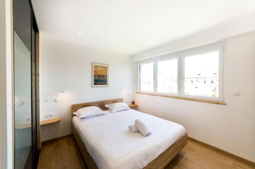 Photo de la galerie de l'établissement Appartement avec balcon - clim et parking AIL, à Lyon