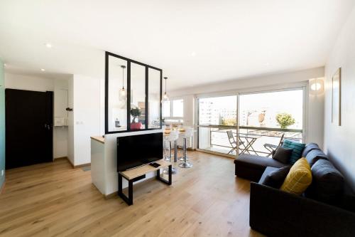 Appartement avec balcon - clim et parking AIL