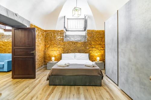 Voodi või voodid majutusasutuse Palermo Stone Charisma: Lovely Apartment x6 toas