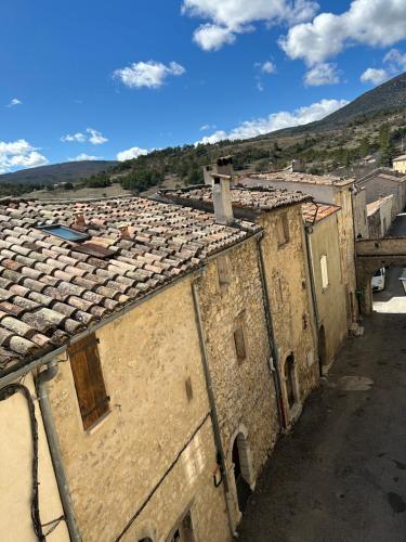 an overhead view of an old building with roofs at LA CALADE in Trigance