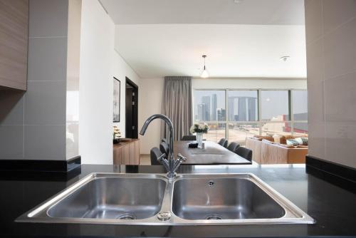 Kuchyň nebo kuchyňský kout v ubytování Exquisite Apartment Rak