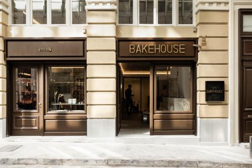 a building with two entrances to a bagel house at Ergon Bakehouse Athens in Athens