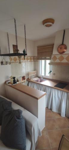 Kuchyň nebo kuchyňský kout v ubytování Apartamento rural El mirador