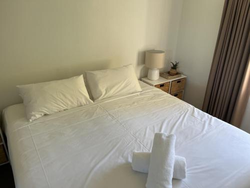 Katil atau katil-katil dalam bilik di Abby’s Beach Villa