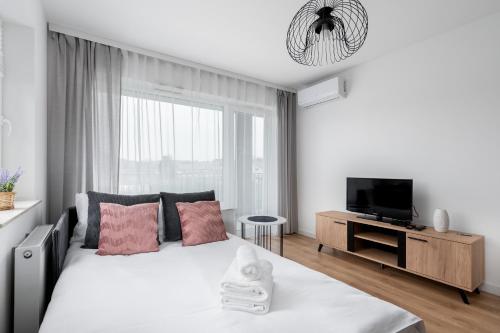 Posteľ alebo postele v izbe v ubytovaní Prokocim Kosocicka Apartment