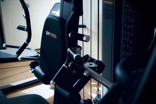 a close up of a gym with a treadmill at Plesners Badehotel in Skagen