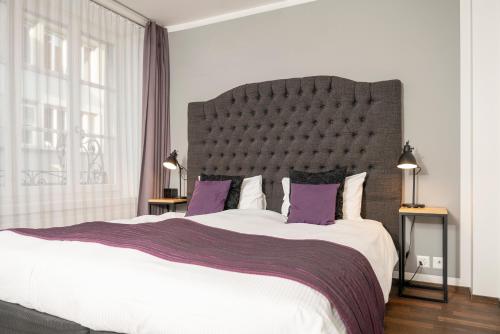 Postel nebo postele na pokoji v ubytování Boutique Hotel Weisses Kreuz - Adult only Hotel