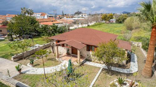 an aerial view of a house with a yard at Sikia Holiday House in Kalamaki Zakynthos in Kalamaki