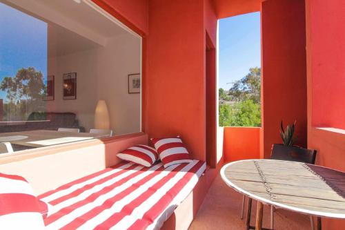 a room with a couch and a table and window at Apartment in Muralla Roja - 0413 in Calpe
