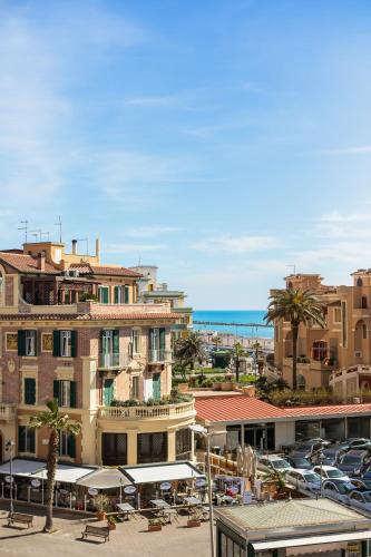 a view of a city with cars and buildings at Guest House Maison 6 in Lido di Ostia