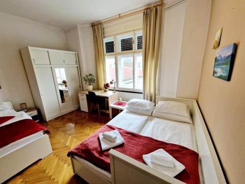 Ένα ή περισσότερα κρεβάτια σε δωμάτιο στο B&B Vila Teslova