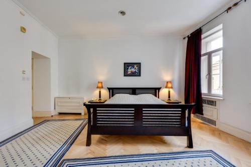 Una cama o camas en una habitación de Boutique Hotel