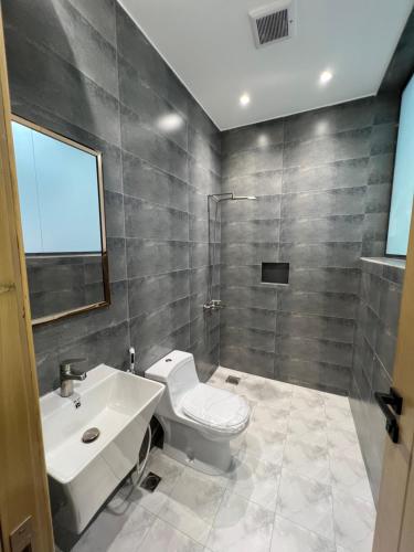 Ένα μπάνιο στο السكن المثالي - alsakan almithaliu