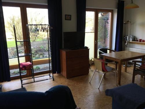 Ruang duduk di Schöne Wohnung in Widukindland mit Grill, Garten und Terrasse