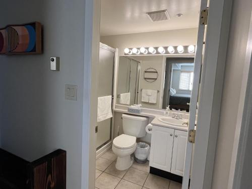 a bathroom with a toilet and a sink at Harbour Retreat in Victoria