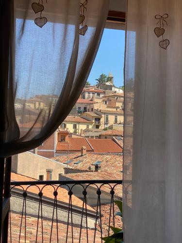 a view of a city from a window at I Cento Portali - Albergo Diffuso in Pignola