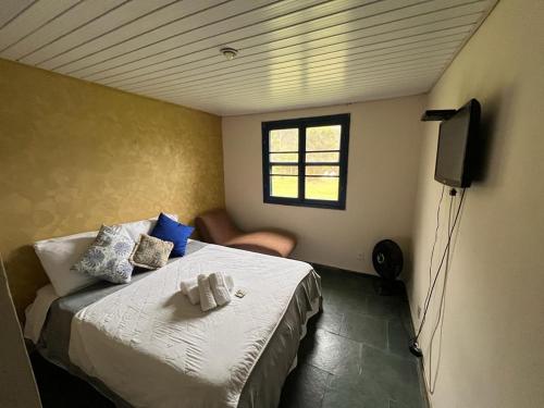 Katil atau katil-katil dalam bilik di Hotel Fazenda Upã Moña