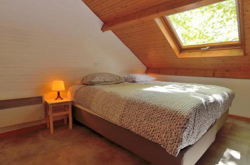 Postel nebo postele na pokoji v ubytování Domaine de la Maridèle - Cussac