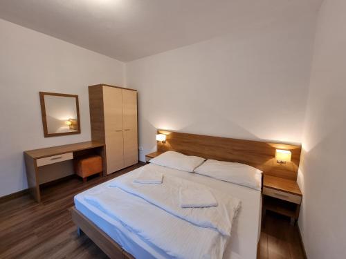 Fatrapark 2 Apartments Houseにあるベッド