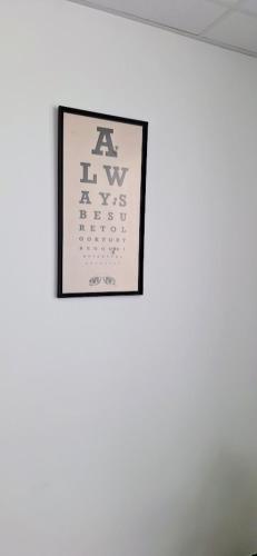 a calendar hanging on a wall in a room at Huis ALNA 5 in Mechelen