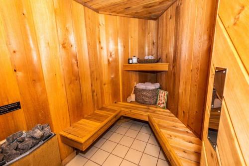 an inside view of a wooden sauna at Luxury Mountain Mansion Huge Pool, Sauna, 7000sqft in Windham
