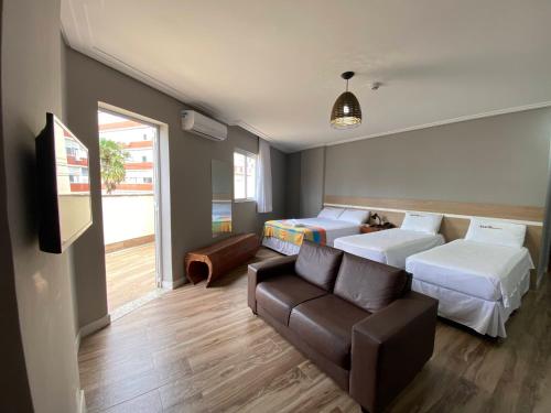 Кровать или кровати в номере Hotel Porto Salvador