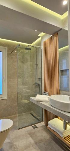 Ванна кімната в Rodos Beach Apartment 33