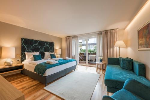 Posteľ alebo postele v izbe v ubytovaní Hotel Mignon Meran Park & Spa