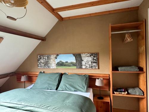 a bedroom with a bed and a window at Landhuis Bovenste Bos in Epen